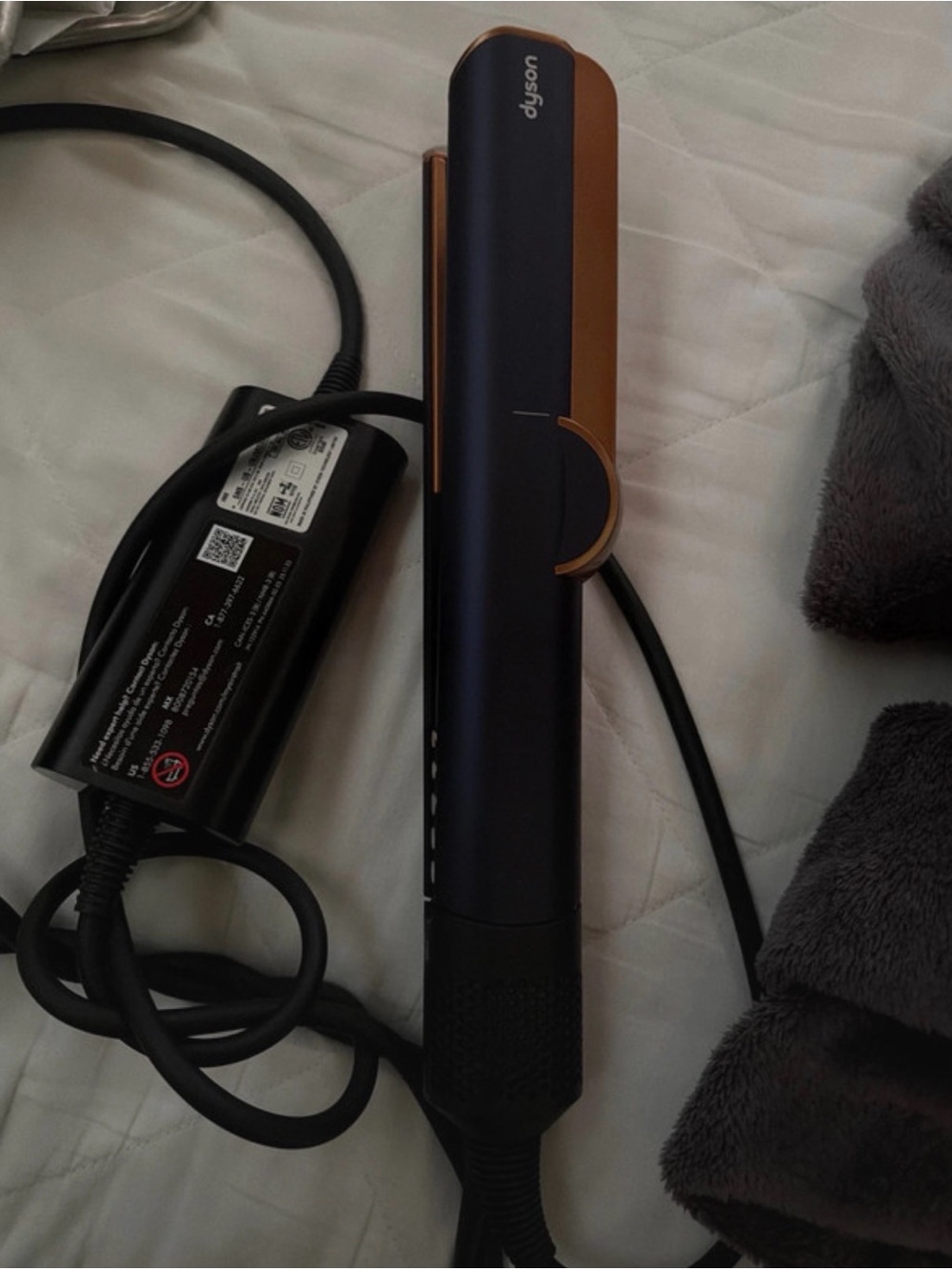 Dyson Airstrait Hair Straightener in purple and Copper Accents